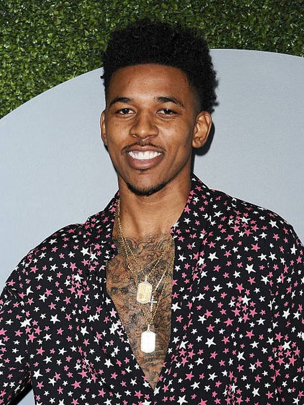 Compare Nick Young's height, weight, eyes, hair color with other celebs